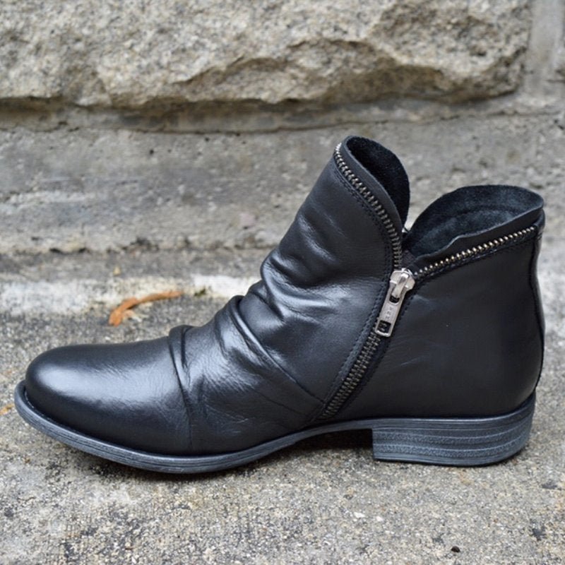 Women ankle boots with zip closure and low heel in multiple colours