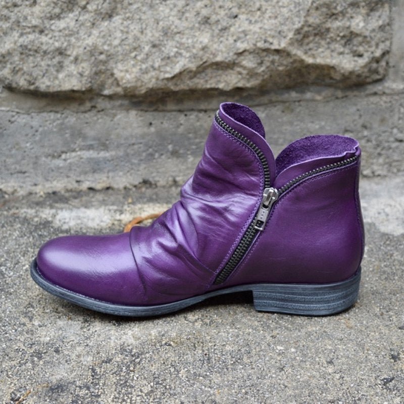 Women ankle boots with zip closure and low heel in multiple colours