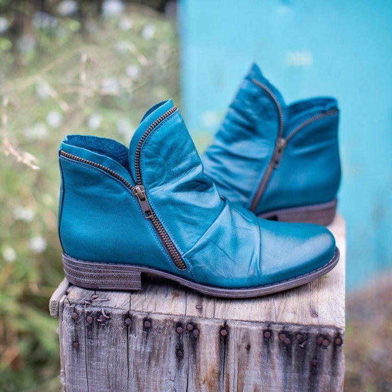 Women ankle boots with zip closure and low heel in multiple colours