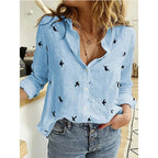 Women's long sleeve button-front blouse in printed and solid styles, relaxed fit