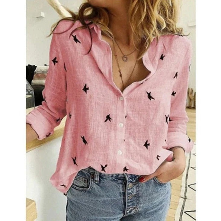 Women's long sleeve button-front blouse in printed and solid styles, relaxed fit