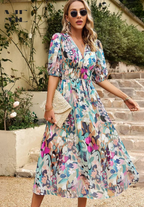 Women floral midi dress with V neck in flowing silhouette