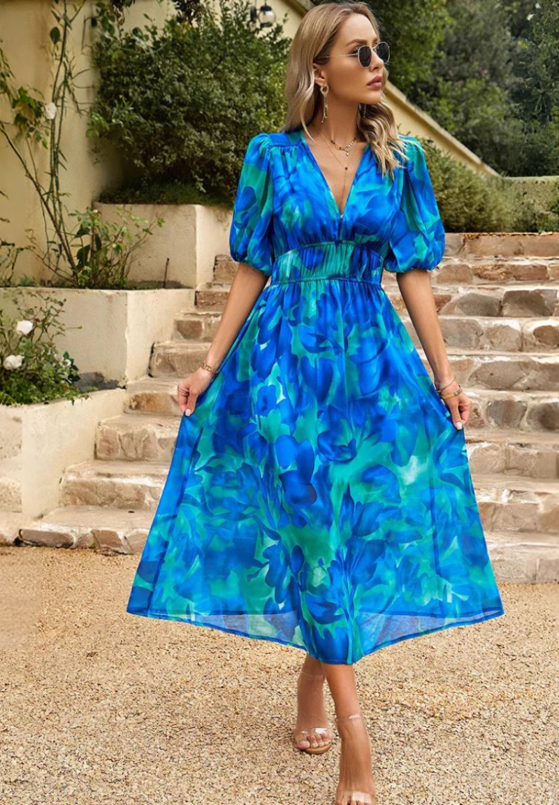 Women floral midi dress with V neck in flowing silhouette