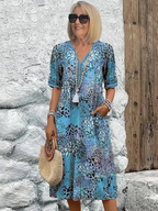Women's printed V-neck A-line midi dress with pockets in multiple colours