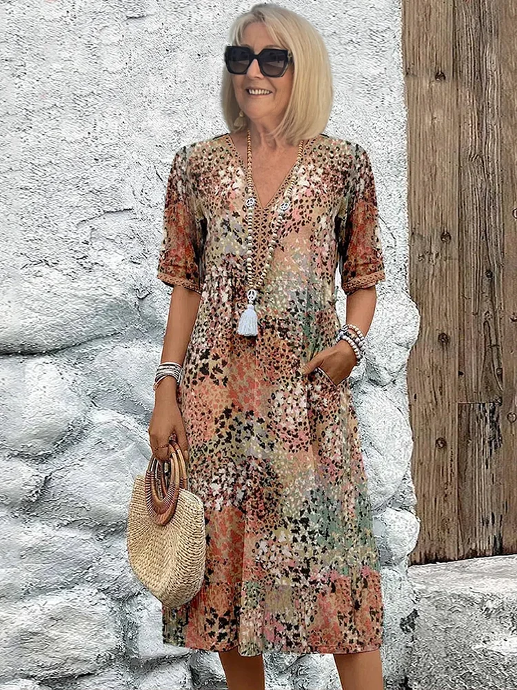 Women's printed V-neck A-line midi dress with pockets in multiple colours
