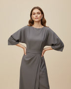 Women's wrap midi dress with puff sleeves and belted waist, available in multiple colours