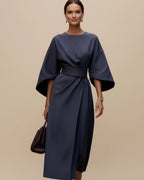 Women's wrap midi dress with puff sleeves and belted waist, available in multiple colours
