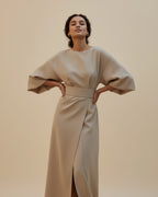 Women's wrap midi dress with puff sleeves and belted waist, available in multiple colours