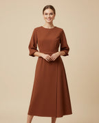 Women's wrap midi dress with puff sleeves and belted waist, available in multiple colours