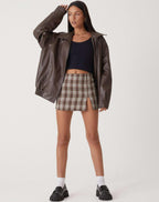 Women's oversized PU leather jacket in brown and black, relaxed fit streetwear style