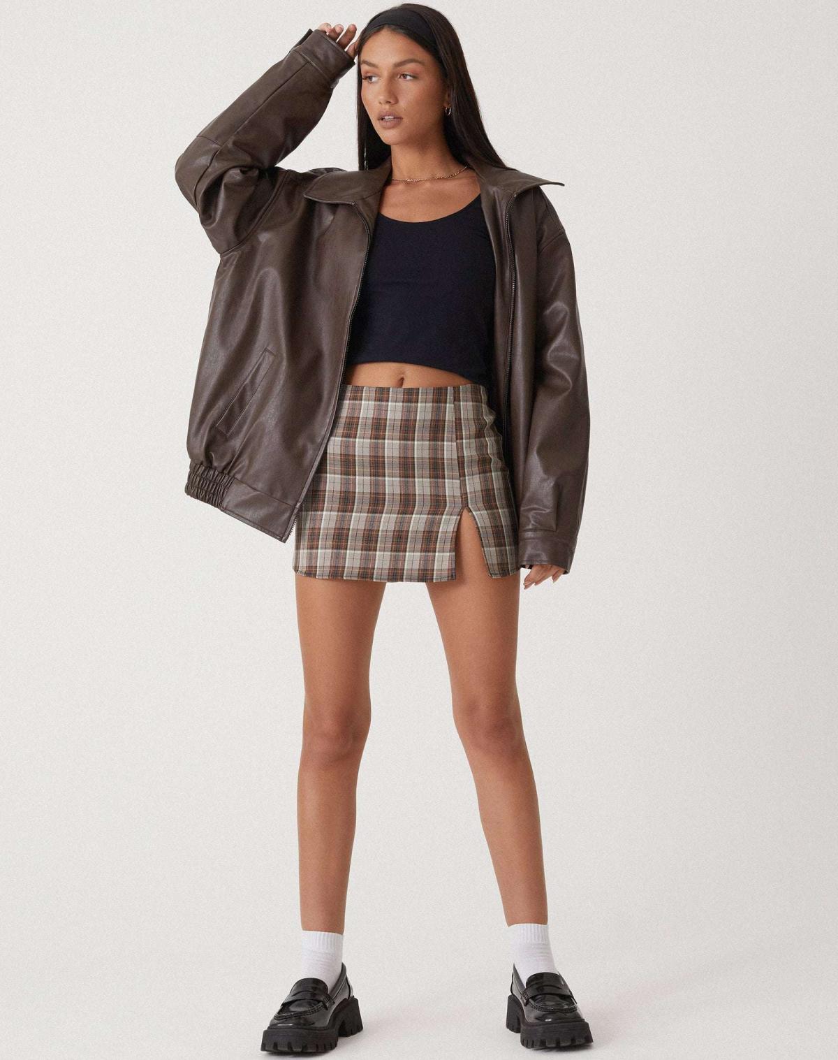 Women's oversized PU leather jacket in brown and black, relaxed fit streetwear style