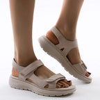 Women mid heel slip-on sandals in beige faux leather strappy design