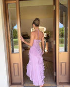Women's formal maxi dress with halter neck and horizontal ruffle tiers, sleeveless floor-length