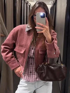 Women cropped zip up bomber jacket with textured detail and sleeve button accents