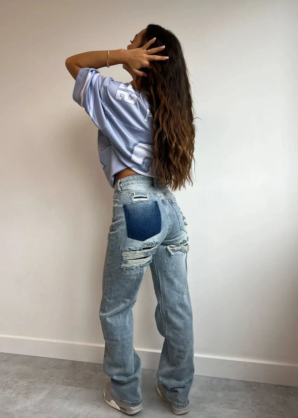 Women's vintage ripped jeans straight leg light blue denim with contrast pockets